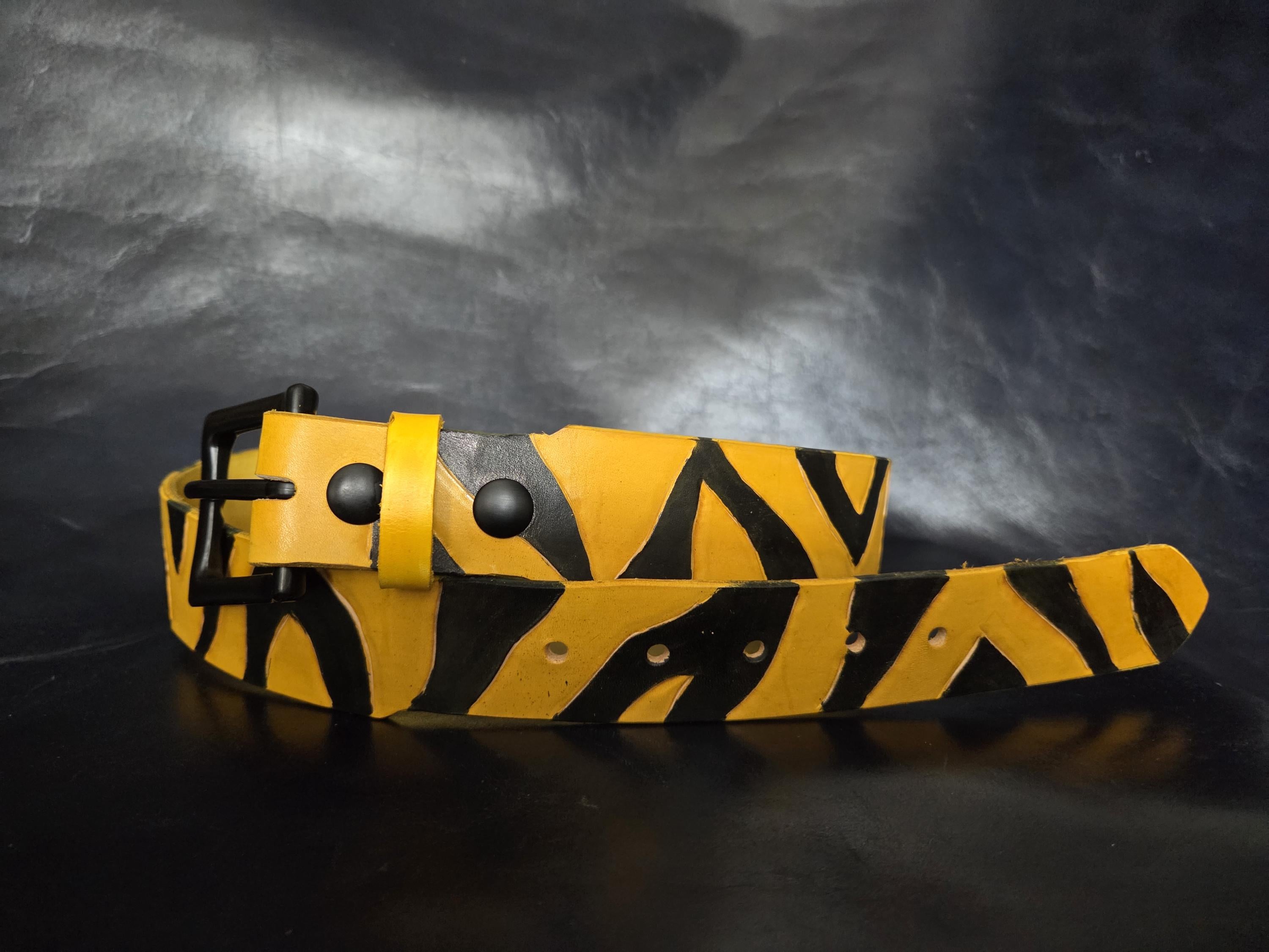Leather tiger-stripe belt.