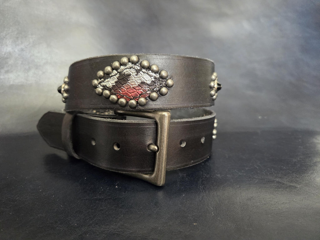 Handmade distressed leather belt with snakeskin print inlays.