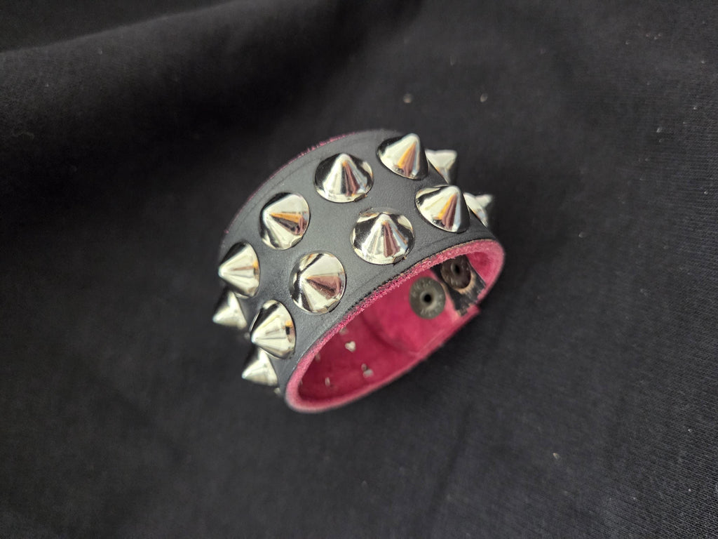 Studded leather punk wrist cuff.