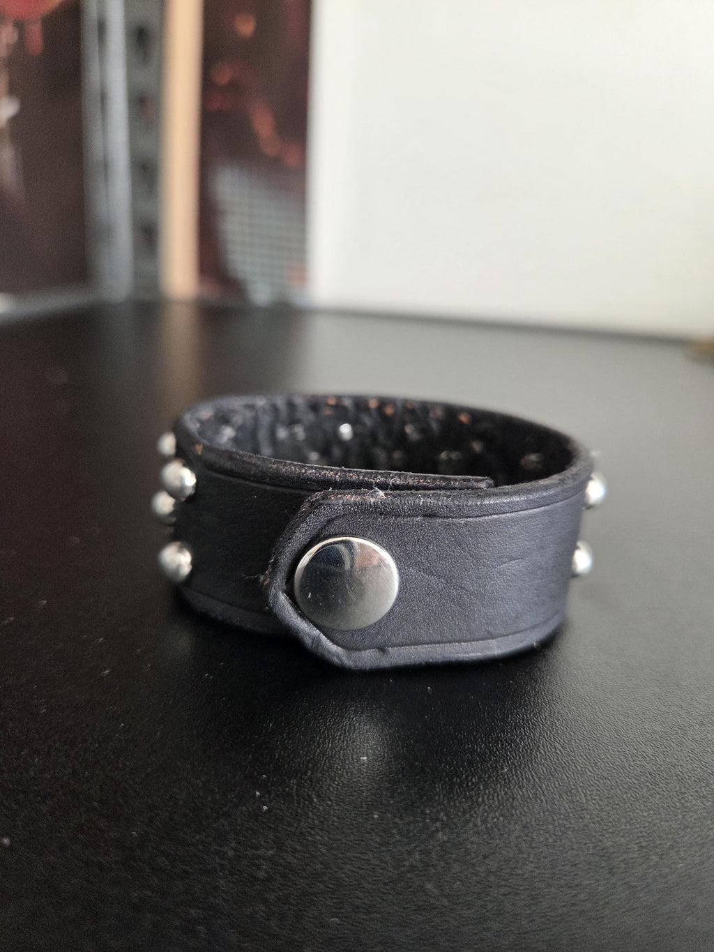 Studded leather punk wrist cuff.