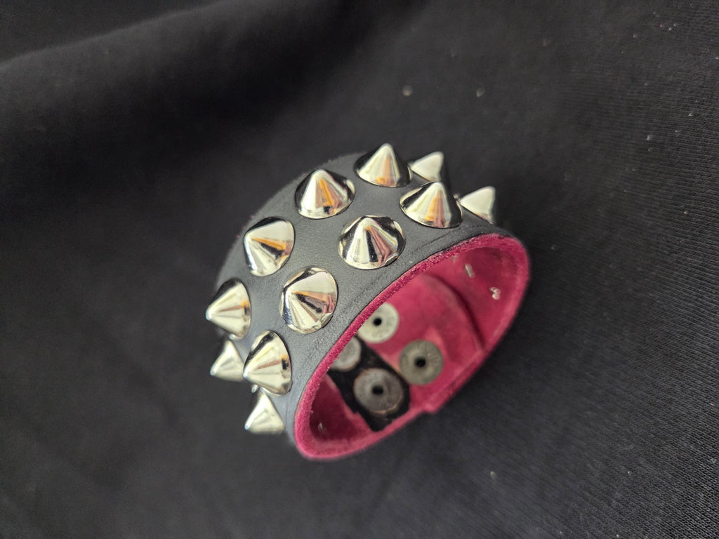 Studded leather punk wrist cuff.