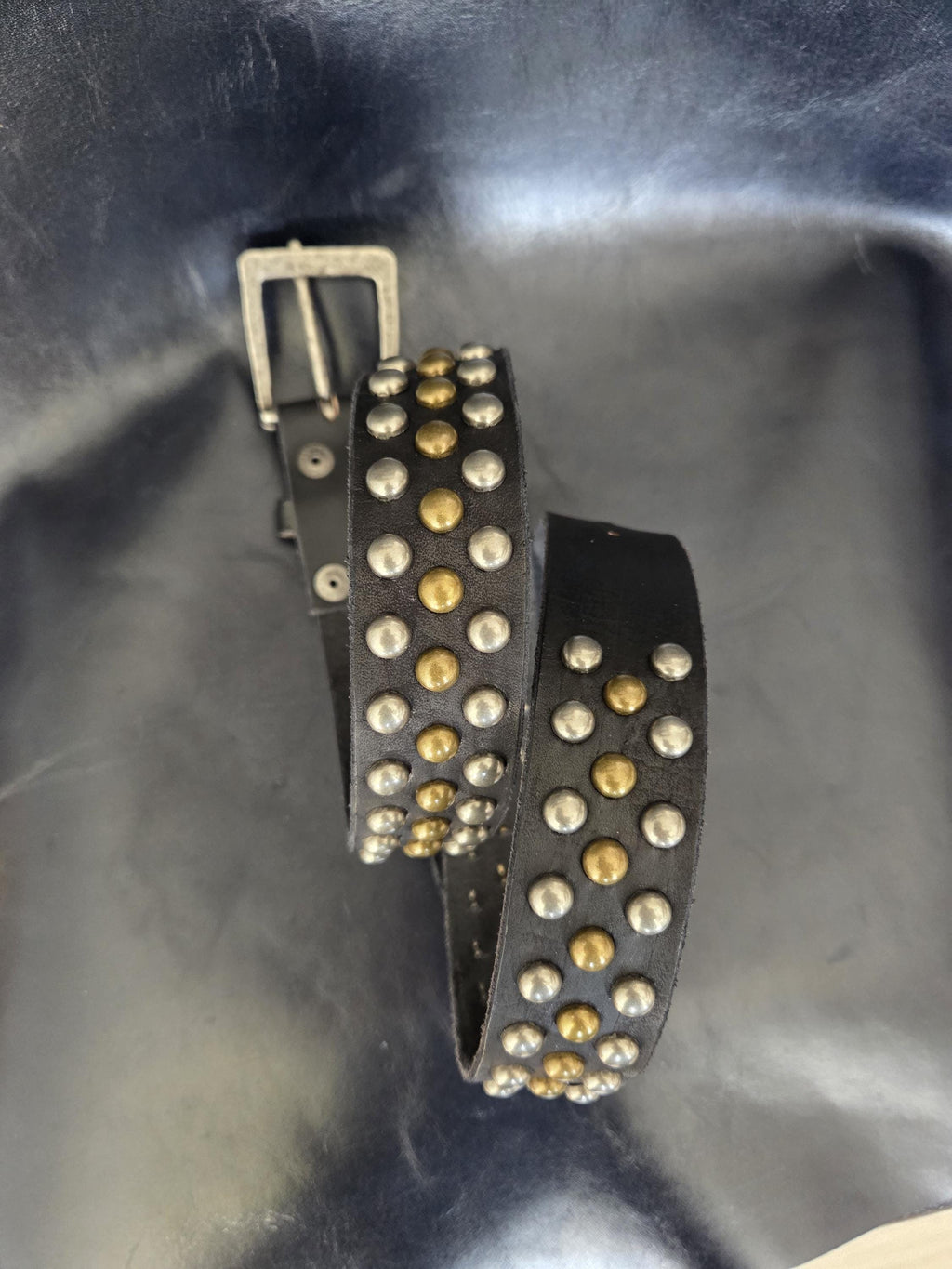 The "Angela" studded leather belt.
