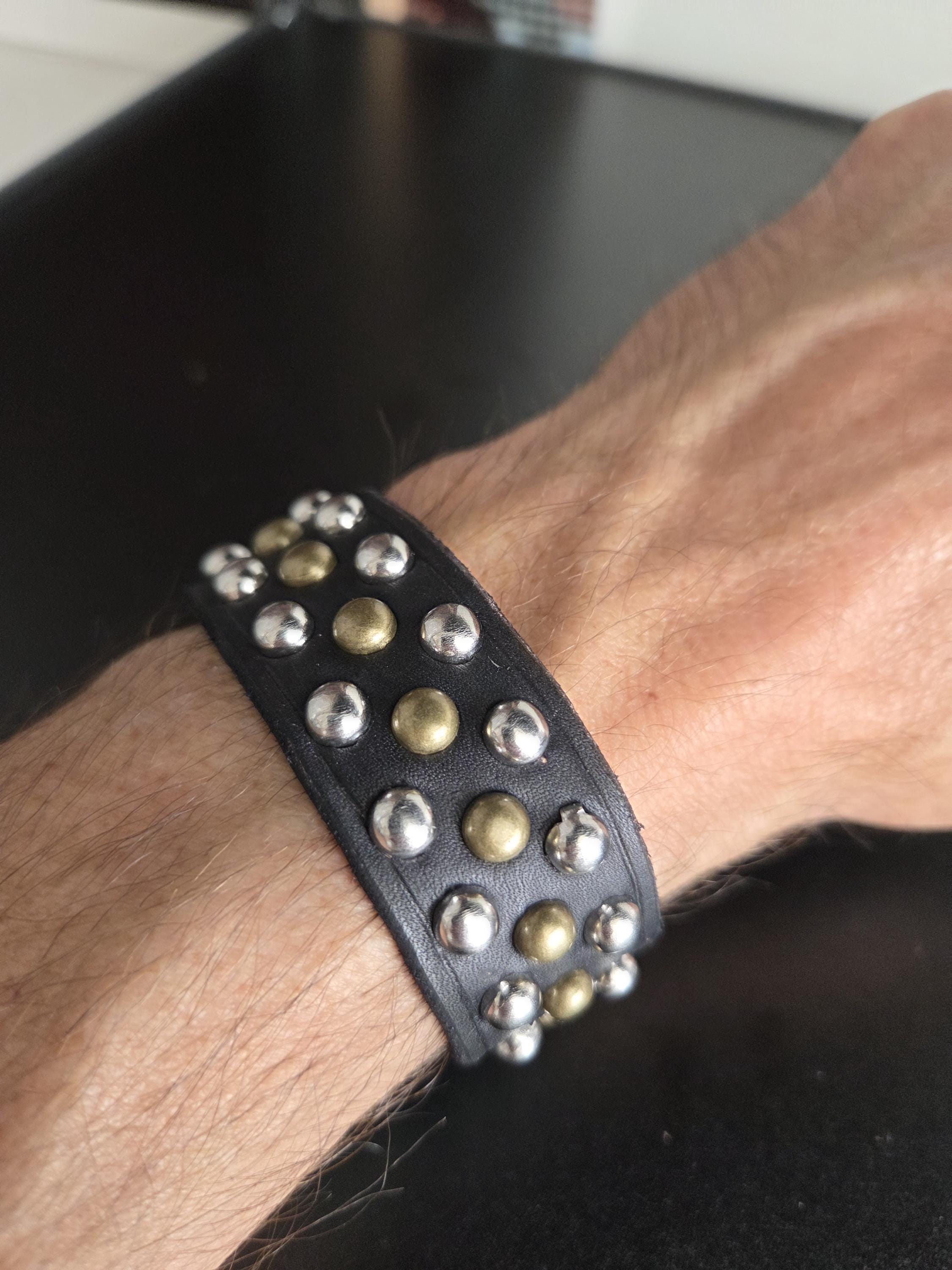 Studded leather punk wrist cuff.