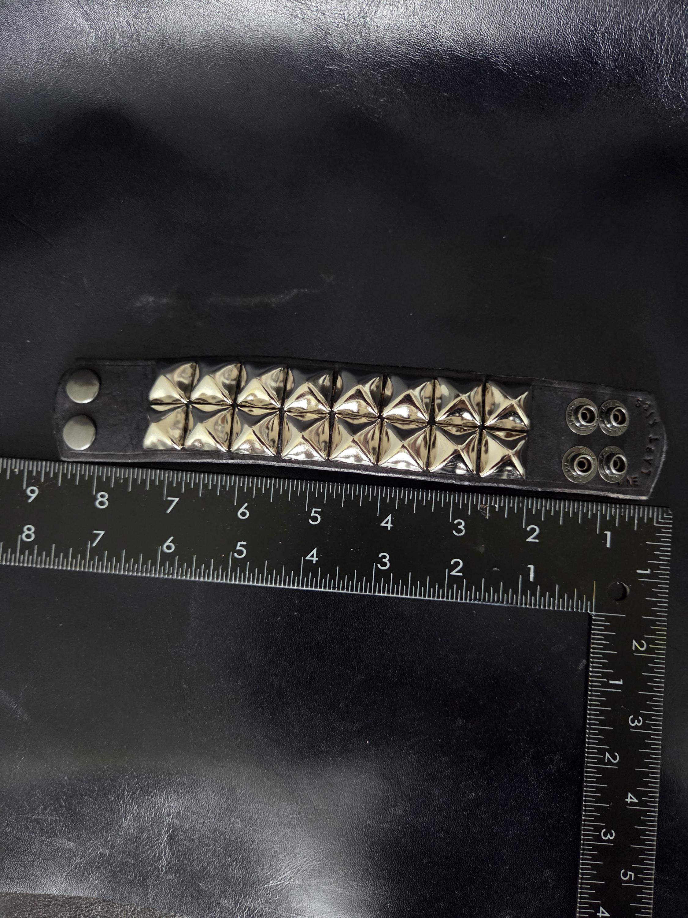 Punk, leather studded wrist cuff.