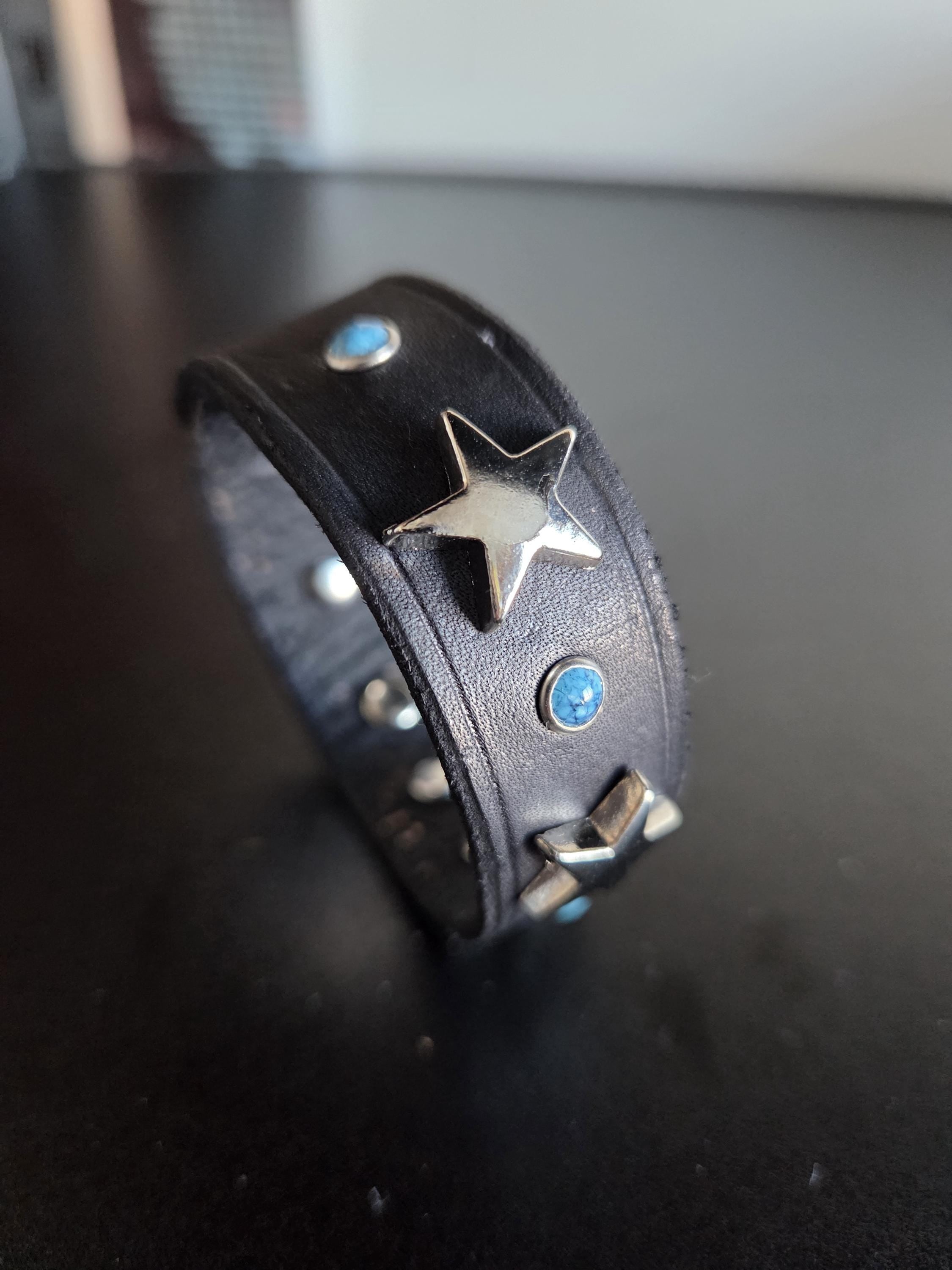 Leather star bracelet with faux turquoise rivets. Size M.
