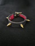 Spiked punk leather bracelet.