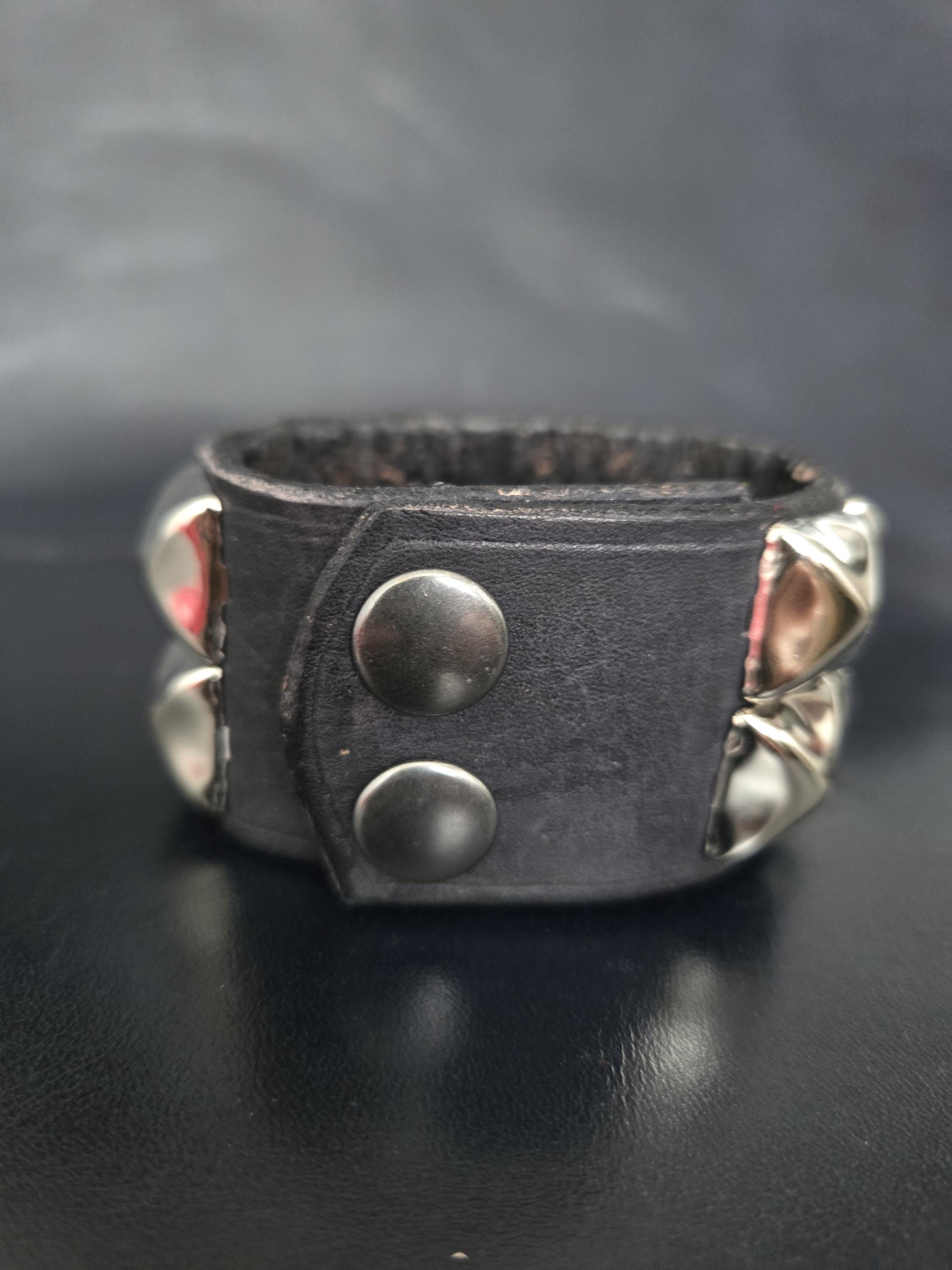 Punk, leather studded wrist cuff.