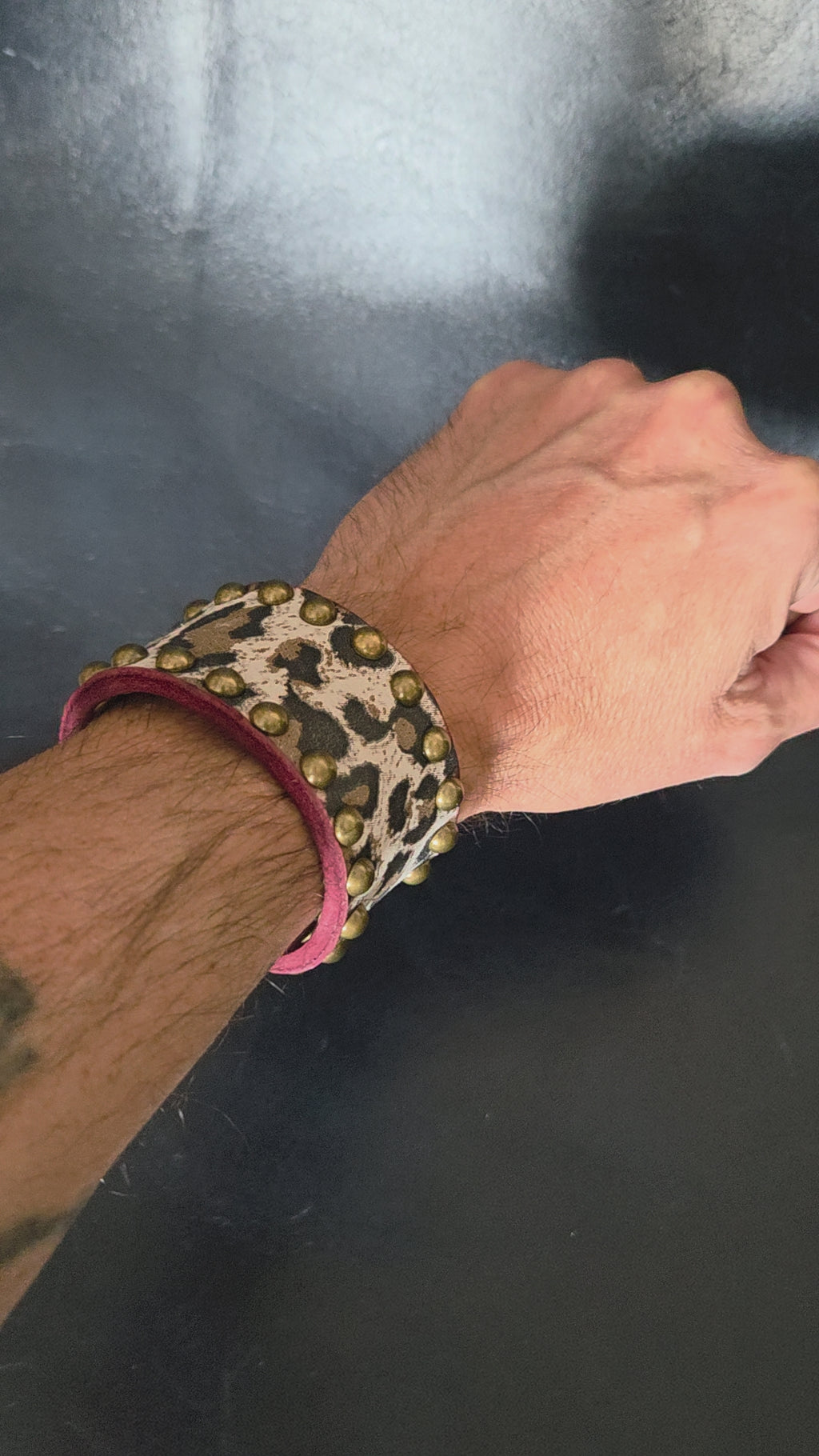Leopard print wrist cuff.